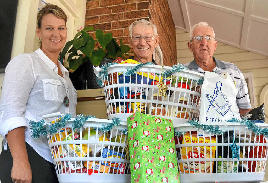 GENEROUS DONATION: Warwick Red Cross administration officer Jodie Gilmore with Warwick Masonic Lodge secretary Ron Bryant and treasurer John Brady show off some of the Christmas goodies bought with the donation. GENEROUS DONATION: Warwick Red Cross administration officer Jodie Gilmore with Warwick Masonic Lodge secretary Ron Bryant and treasurer John Brady show off some of the Christmas goodies bought with the donation.
